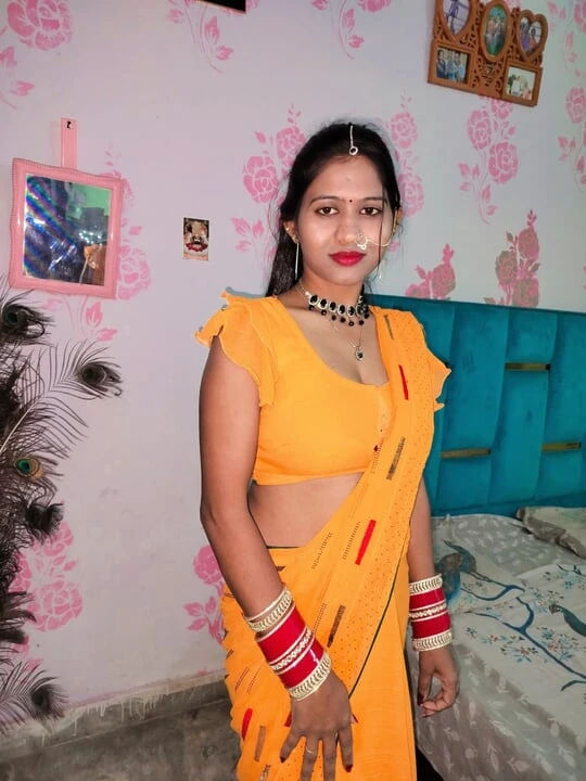 Desi Indian bhabhi in yellow saree looking hot and sexy